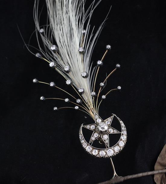A Victorian gold and silver, diamond crescent and star brooch, now converted to a pendant, pendant 1.25in.